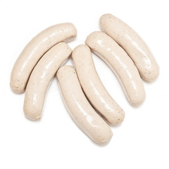 German Bratwurst sausages isolated on a white studio background.