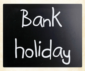 "Bank holiday" handwritten with white chalk on a blackboard