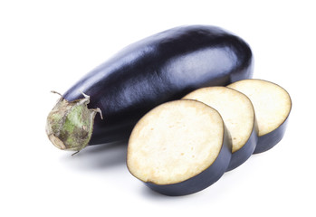 Fresh eggplant with slices isolated on white