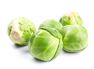 Fresh green Brussels sprouts isolated on white