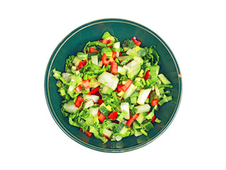Fresh spring salad in a bowl, isolated on a white background