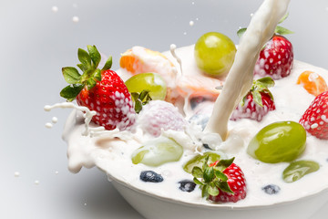 Fresh fruits and milk splash