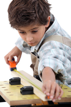 Boy doing carpentry
