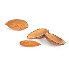 almond nut, one cracked open, isolated