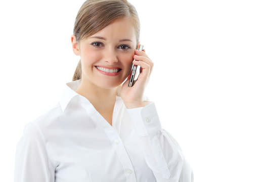 Beautiful smiling business woman talking on the phone