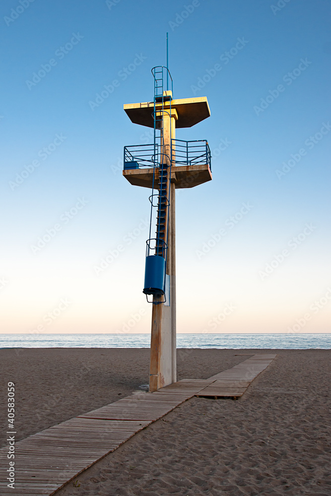 Poster watchtower on a beach