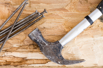 Old hammer with nails