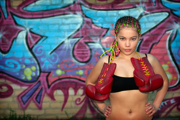 Girl with red boxing gloves