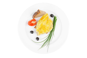 served fish fillet with greek olives