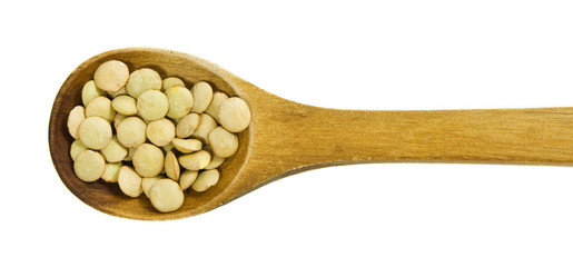 Lentils in a wooden spoon