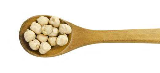 Chickpeas in a wooden spoon