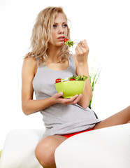 healthy sexy woman with salad on white background