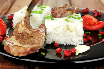 barbecued ribs served with rice