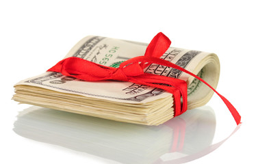 A lot of one hundred dollar bills tied red ribbon isolated