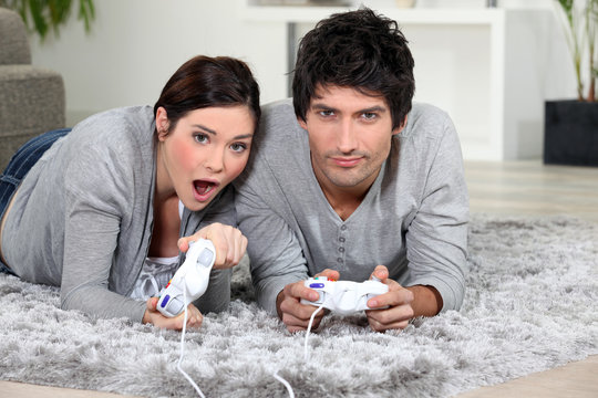 Couple playing a video game together