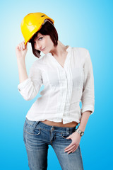 female worker in yellow helmet.