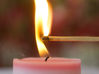 A candle is fired by a match