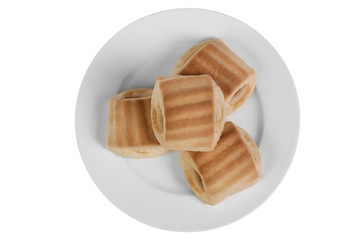 Four cookies in plate composition