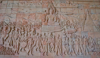 Thai traditional culture on stone wall