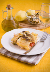 Rice, potatoes and mussels. Tiella di riso, patate e cozze.
