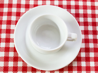 white coffee pair on checkered tablecloth