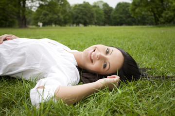 Woman laying on grass