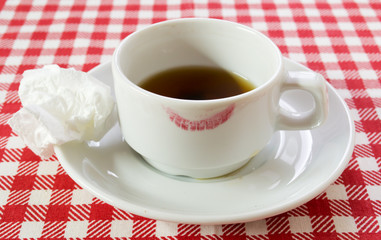 white coffee pair on checkered tablecloth