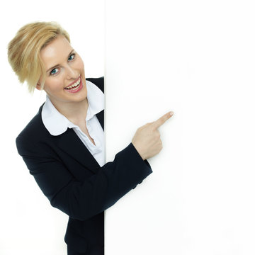 Blonde business woman with white message board