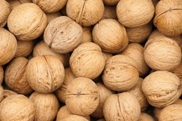 Heaps of valnuts on market place Naschmarkt, Vienna, Austria