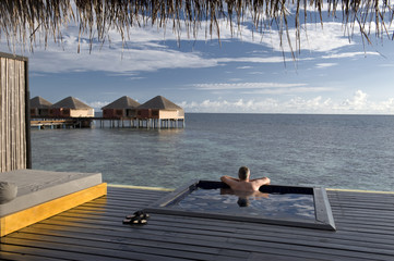 Relaxing at pool with ocean view