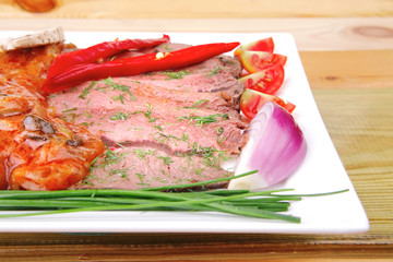 corned beef on plate with vegetables