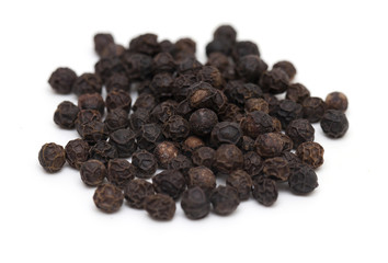 pile of black peppercorns