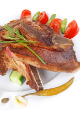 roasted beef meat bone steak on ceramic dish