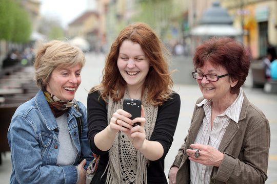 Family Making Fun At Street