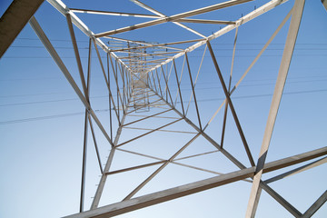 inside of steel pylon on blue sky