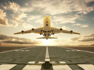 Airplane taking off at sunset - obrazy, fototapety, plakaty