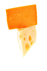 gourmet yellow cheeses  isolated over white