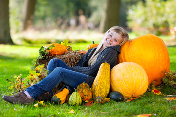 autumn girl with pumpkin