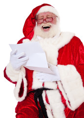 Weihnachtsmann liest Wunschzettel