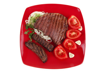 italian food : pasta with tomato and grilled sirloin