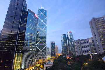 Obraz premium office building at night in hong kong