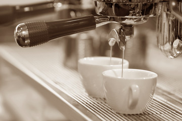 Espresso machine brewing a coffee espresso