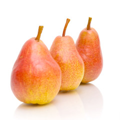 three pears on white background close-up