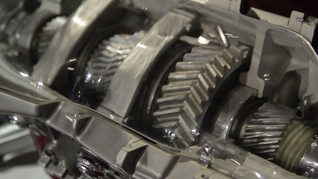 Car Manufacturing. Close up on the gears of a car engine.