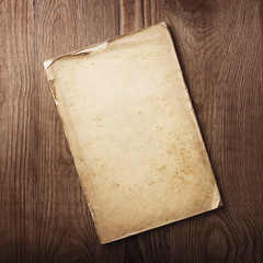 old papers on a wooden table