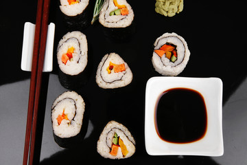 Sushi Maki Roll on black plate