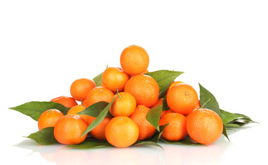 Ripe tasty tangerines with leaves isolated on white