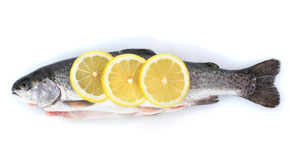 Fresh fish with lemon isolated on white.