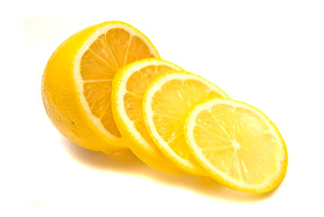 Lemon slices and fresh lemon