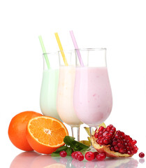 Milk shakes with fruits isolated on white